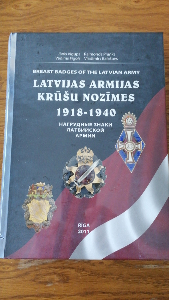 Breast badges of thre Latvian army