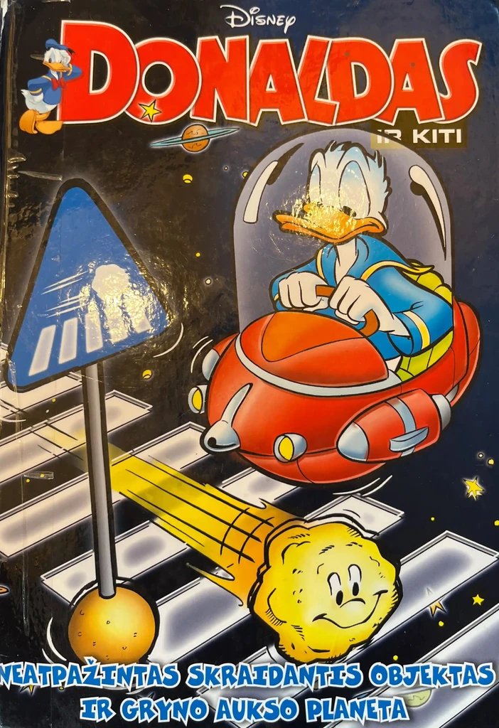 Donaldas ir kiti. Neatpažintas skraidantis objektas ir gryno aukso planeta